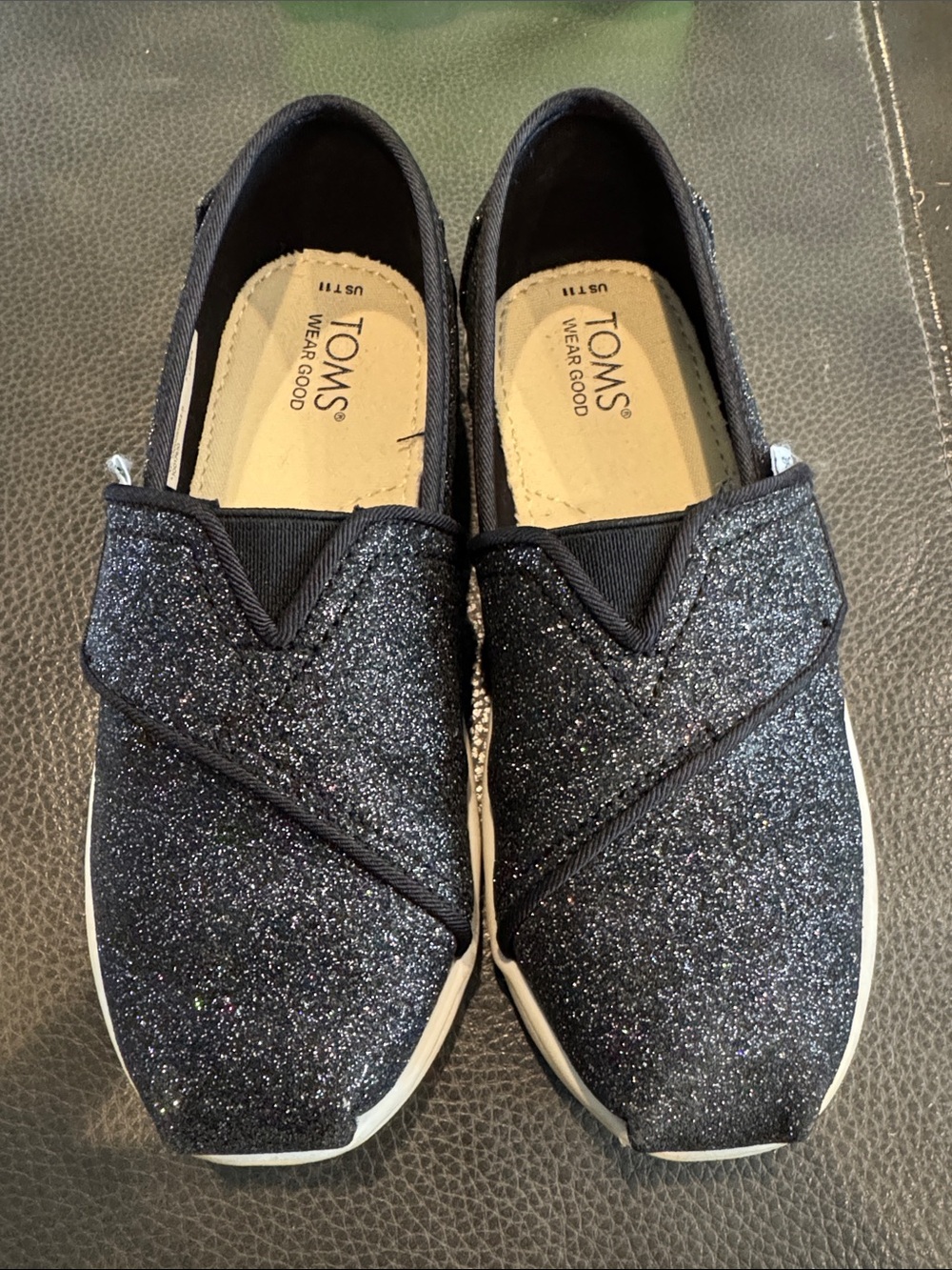 TOMS Kids Black Glitter Slip-On Moccasins